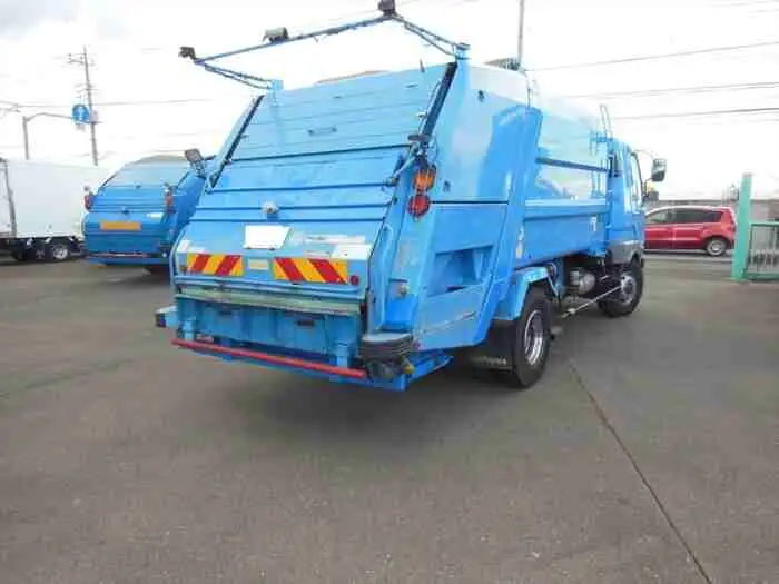 三菱 ファイター 中型/増トン パッカー車 プレス式 ベッドの中古トラック画像2