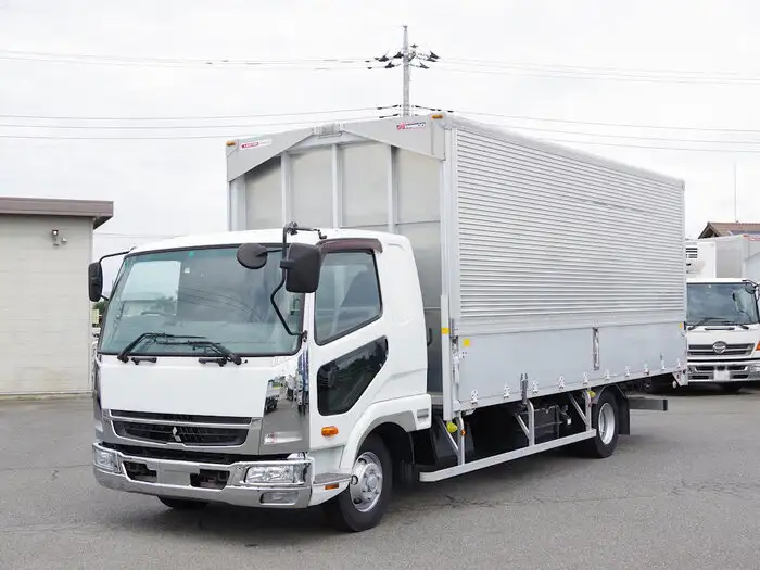 三菱 ファイター 中型/増トン ウイング エアサス ベッドの中古トラック画像1