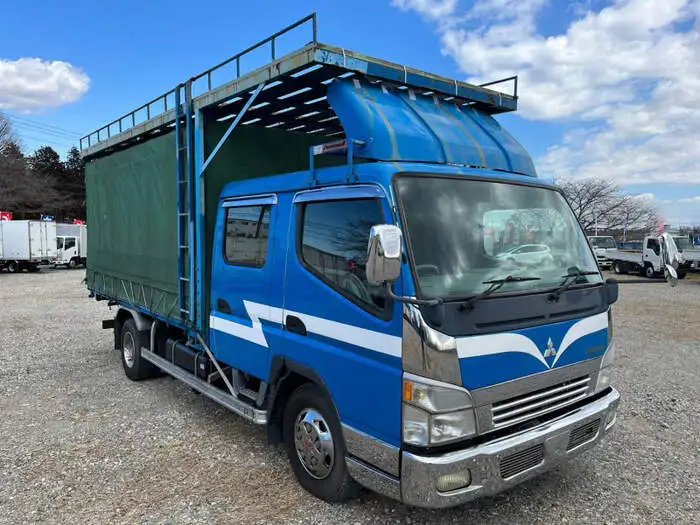三菱 キャンター 小型 平ボディ Wキャブ 幌の中古トラック画像2