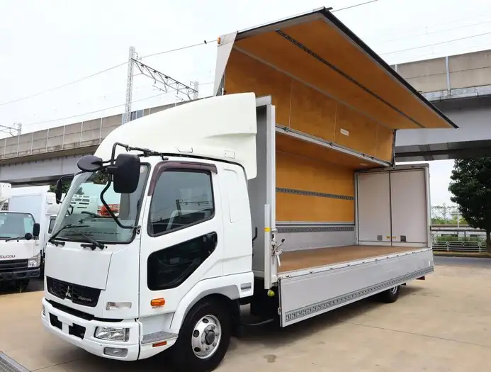 三菱 ファイター 中型/増トン ウイング ベッド TKG-FK61Fの中古トラック画像1