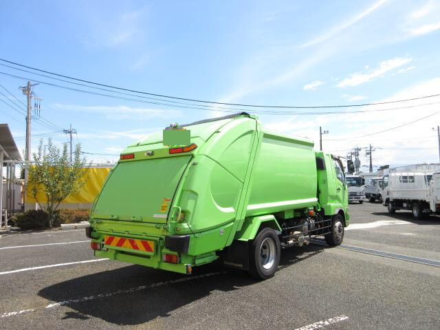 三菱 ファイター 中型 パッカー車 プレス式 ベッド｜画像3