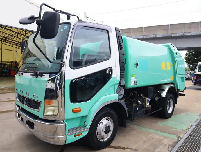 三菱 ファイター 中型/増トン パッカー車 巻き込み式 回転ダンプ式の中古トラック画像1