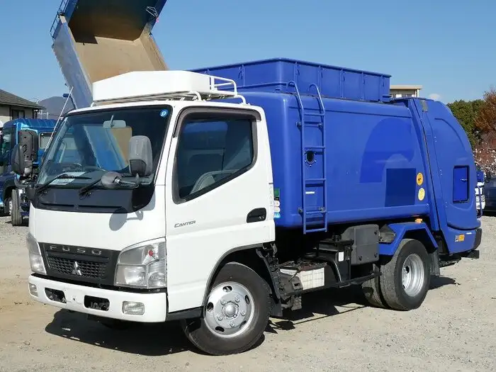 三菱 キャンター 小型 パッカー車 プレス式 回転ダンプ式の中古トラック画像1