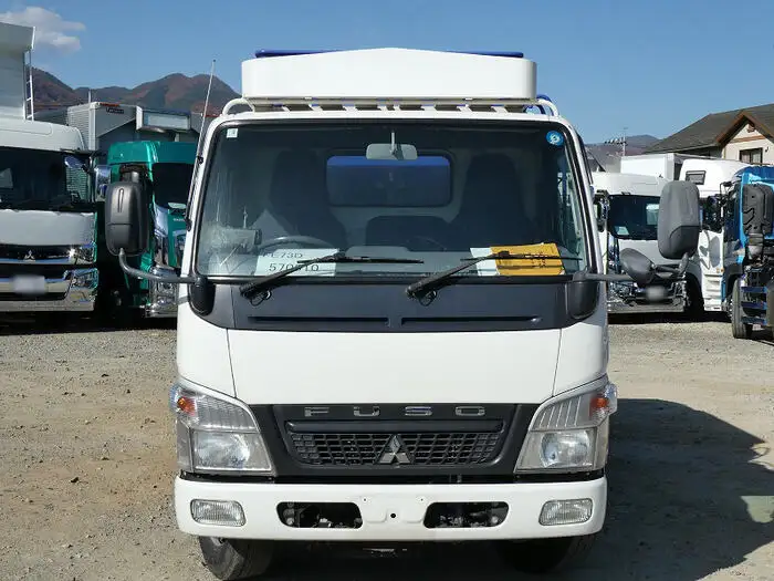 三菱 キャンター 小型 パッカー車 プレス式 回転ダンプ式の中古トラック画像2