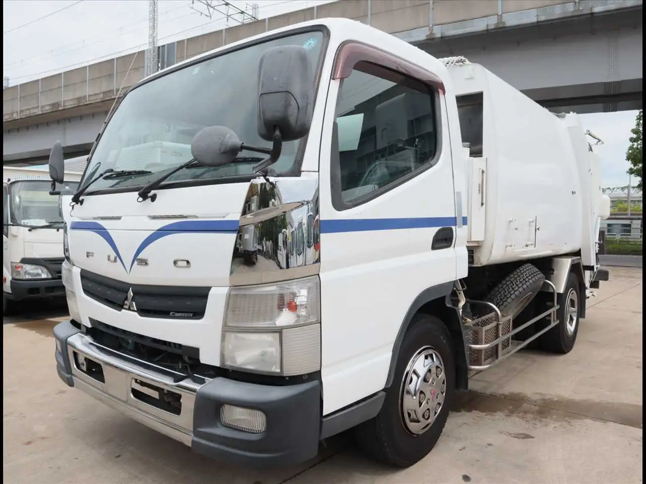 三菱 キャンター 小型 パッカー車 プレス式 TKG-FEB90の中古トラック画像1