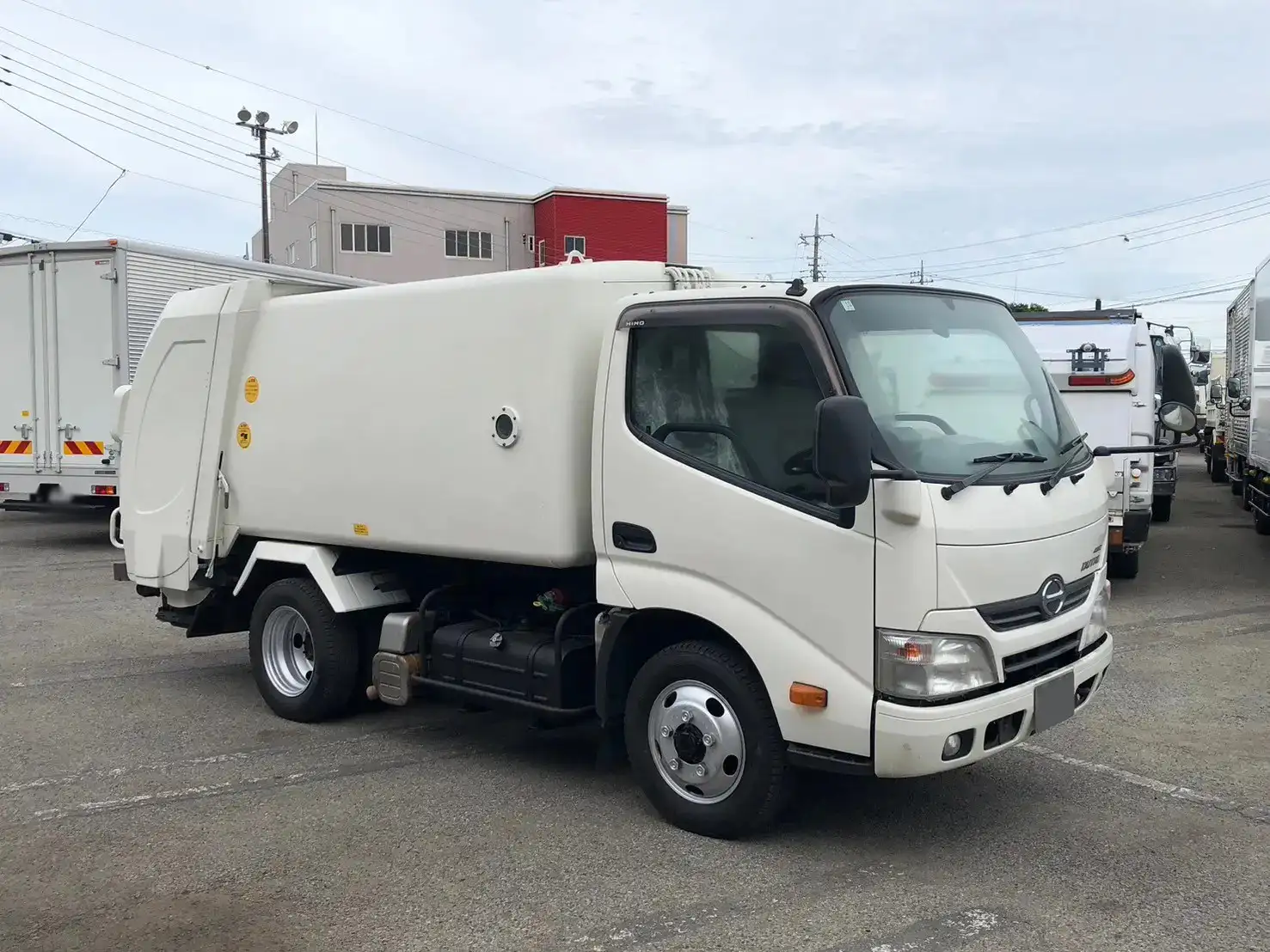 日野 デュトロ 小型 パッカー車 巻き込み式 回転ダンプ式の中古トラック画像2