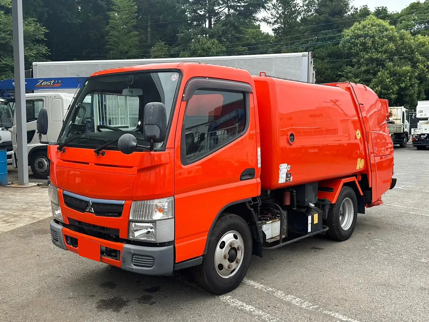 三菱 キャンター 小型 パッカー車 巻き込み式 回転ダンプ式の中古トラック画像1