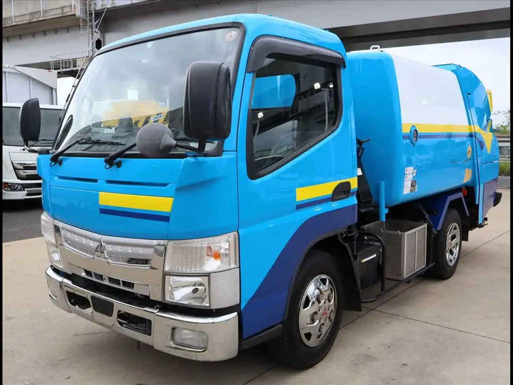 三菱 キャンター 小型 パッカー車 巻き込み式 回転ダンプ式の中古トラック画像1