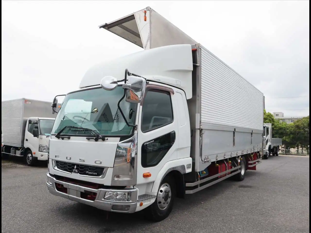 三菱 ファイター 中型/増トン ウイング ベッド TKG-FK61Fの中古トラック画像1