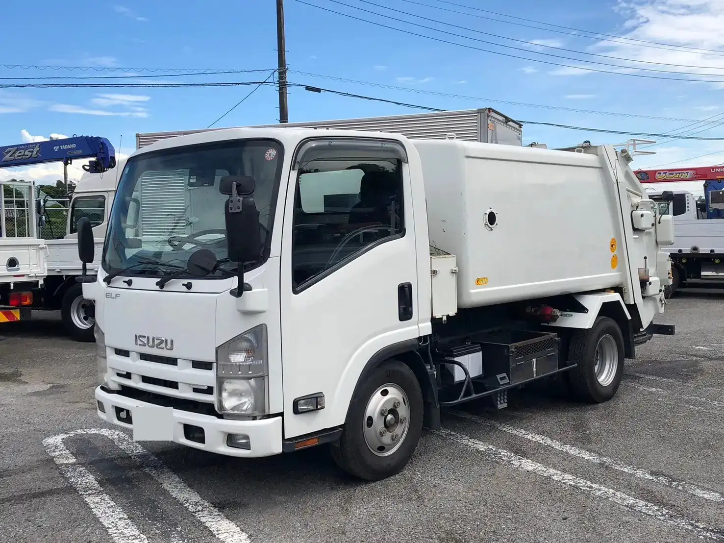 いすゞ エルフ 小型 パッカー車 巻き込み式 回転ダンプ式の中古トラック画像1