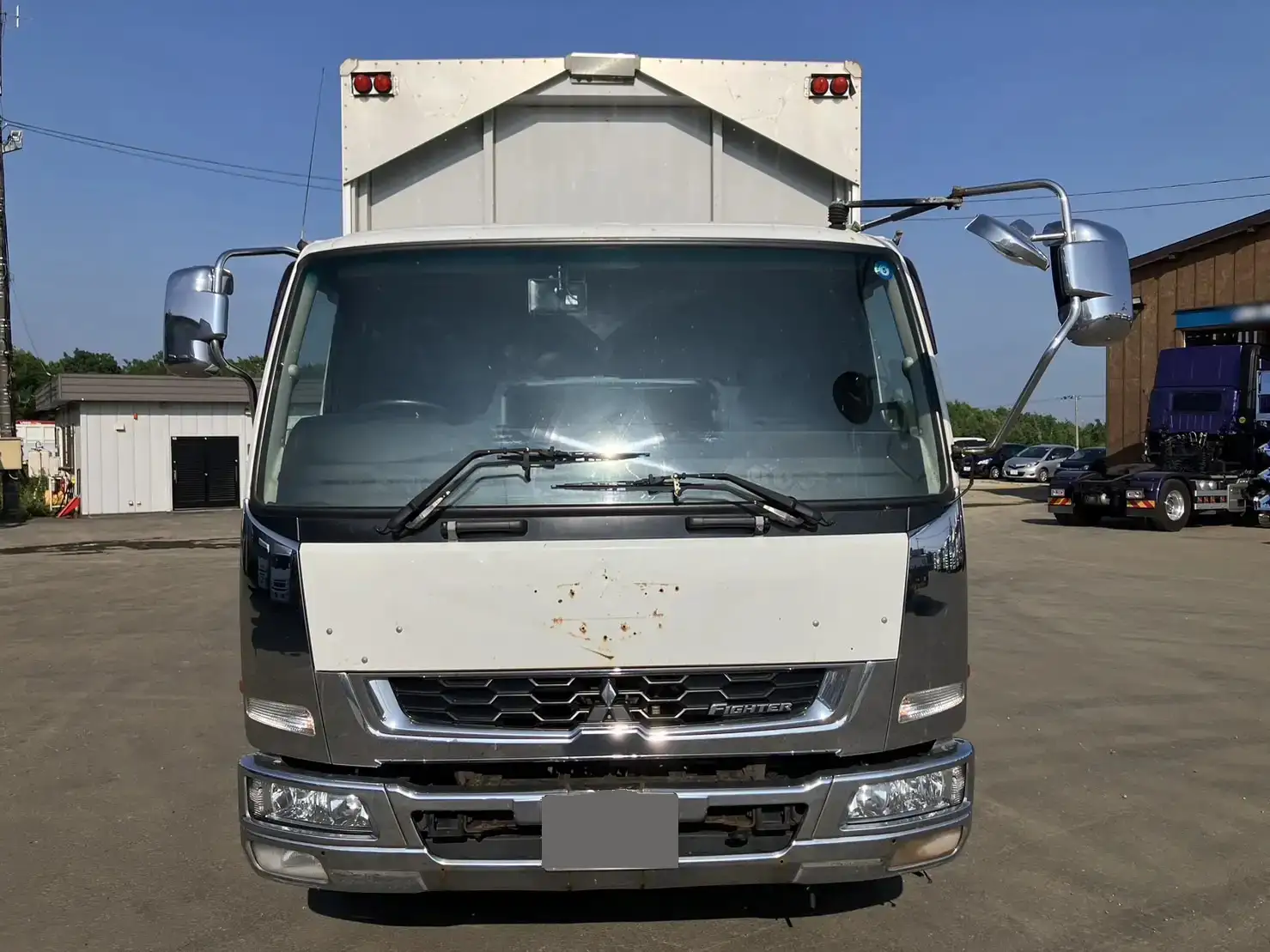三菱 ファイター 中型/増トン ウイング ベッド 2KG-FK64Fの中古トラック画像2