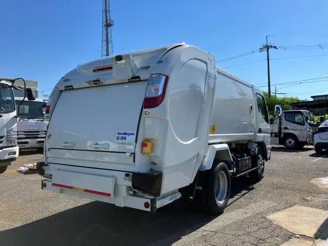 三菱 キャンター 小型 パッカー車 巻き込み式 回転ダンプ式の中古トラック画像2