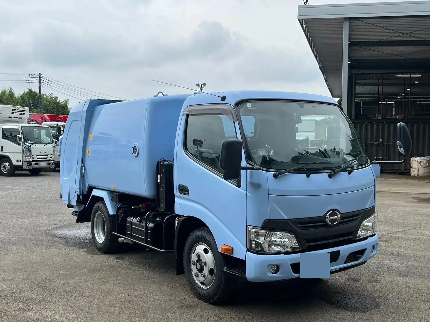 日野 デュトロ 小型 パッカー車 巻き込み式 回転ダンプ式の中古トラック画像2
