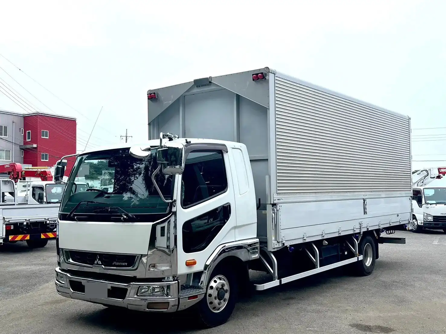 三菱 ファイター 中型/増トン ウイング エアサス ベッドの中古トラック画像1