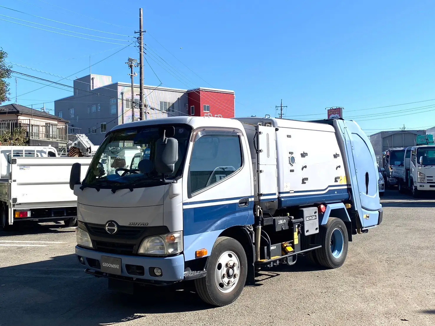日野 デュトロ 小型 パッカー車 巻き込み式 回転ダンプ式の中古トラック画像1