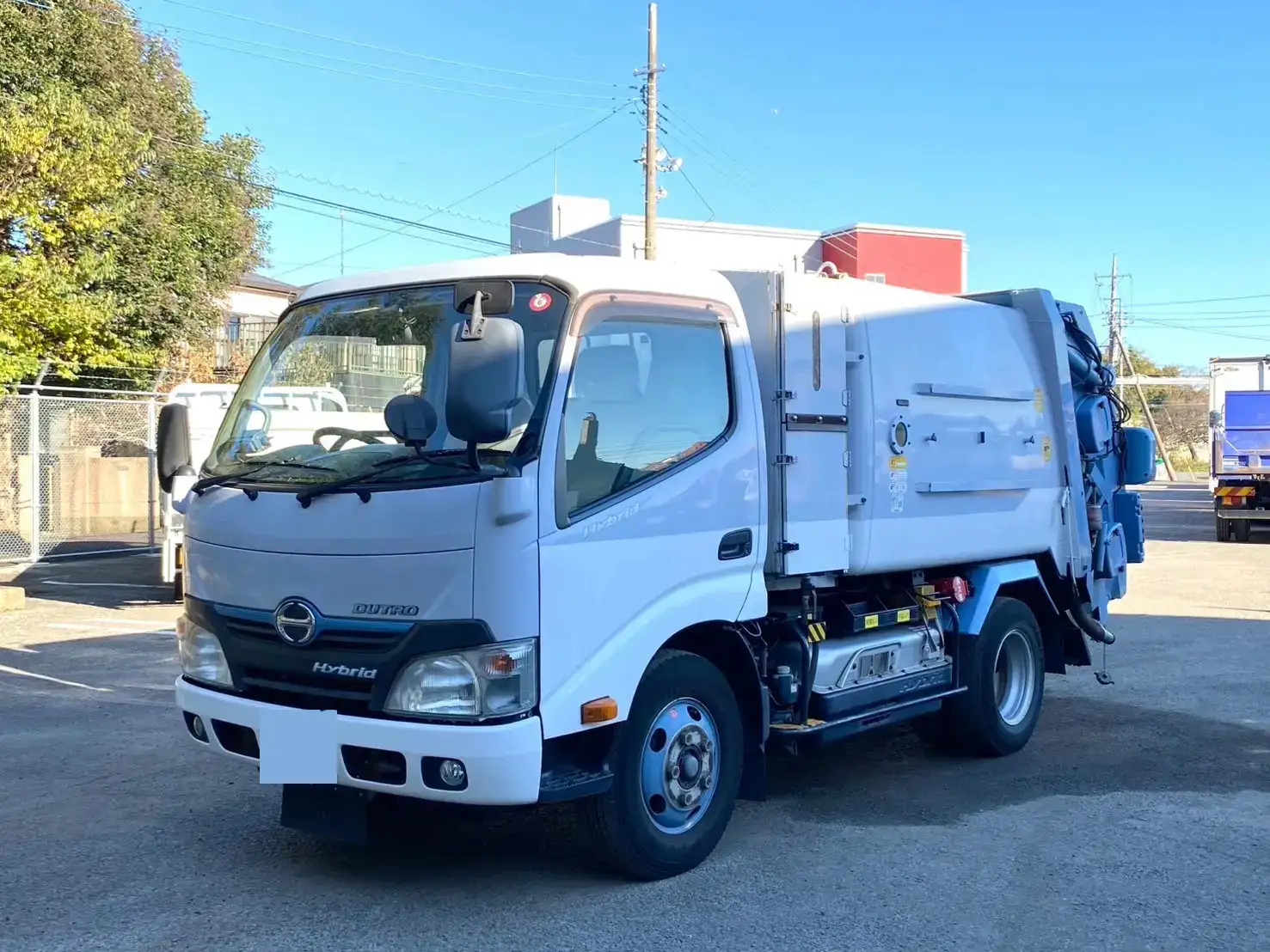日野 デュトロ 小型 パッカー車 巻き込み式 回転ダンプ式の中古トラック画像1