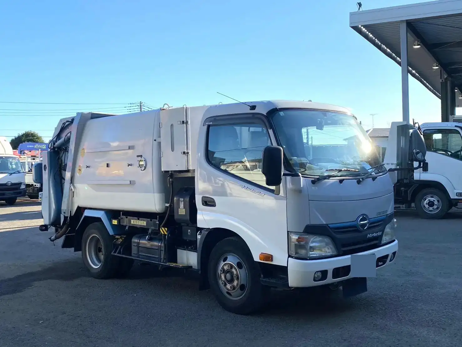 日野 デュトロ 小型 パッカー車 巻き込み式 回転ダンプ式の中古トラック画像2