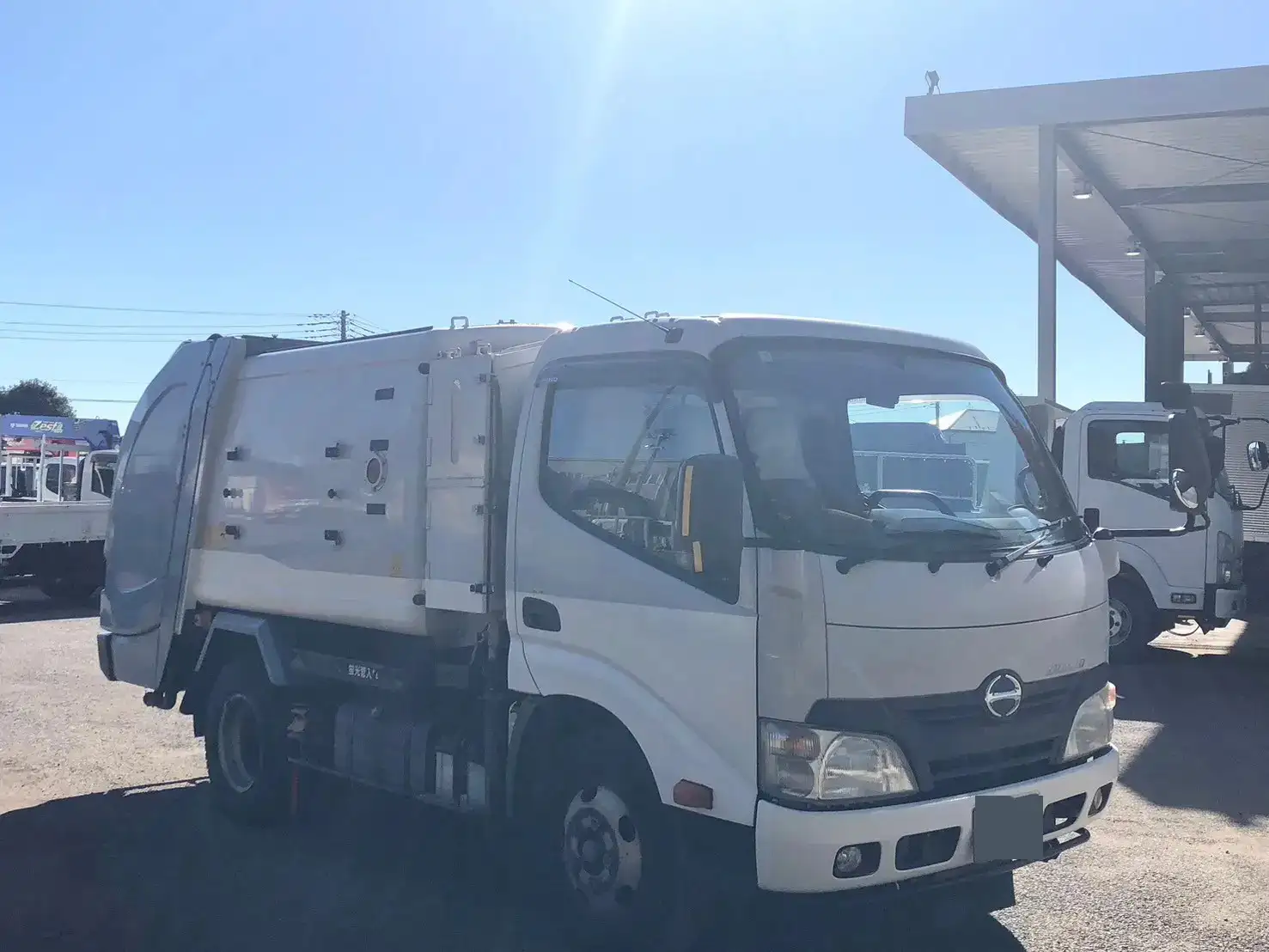 日野 デュトロ 小型 パッカー車 巻き込み式 回転ダンプ式の中古トラック画像2