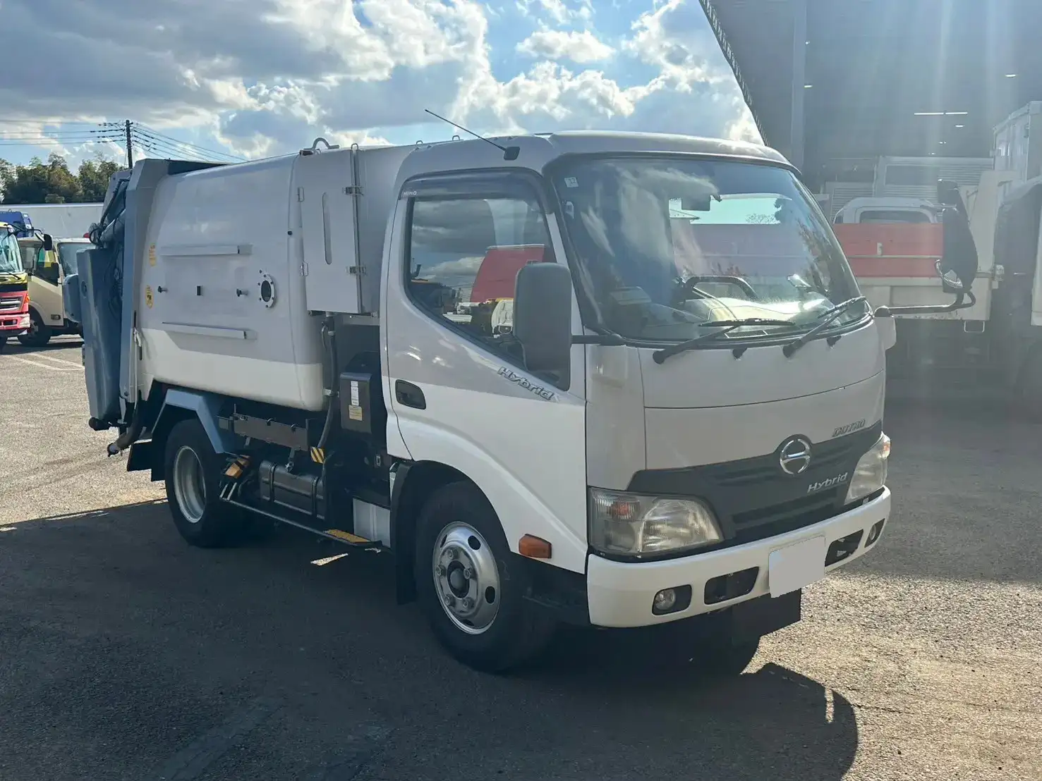 日野 デュトロ 小型 パッカー車 巻き込み式 回転ダンプ式の中古トラック画像2