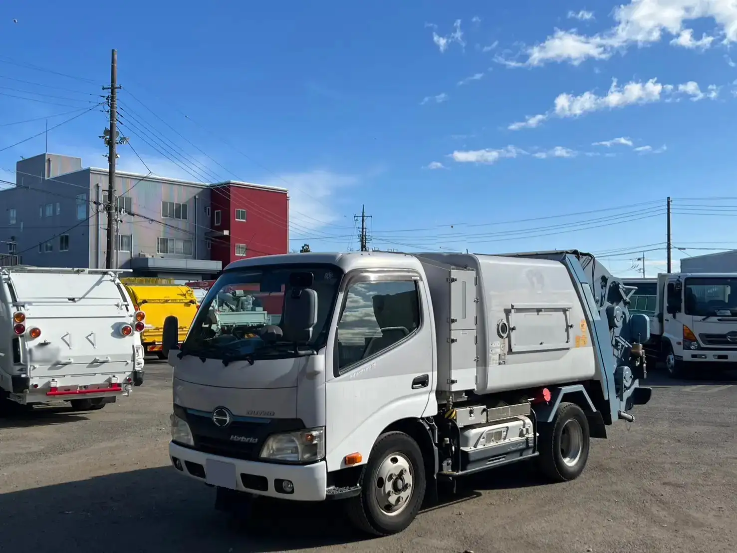 日野 デュトロ 小型 パッカー車 巻き込み式 回転ダンプ式の中古トラック画像1