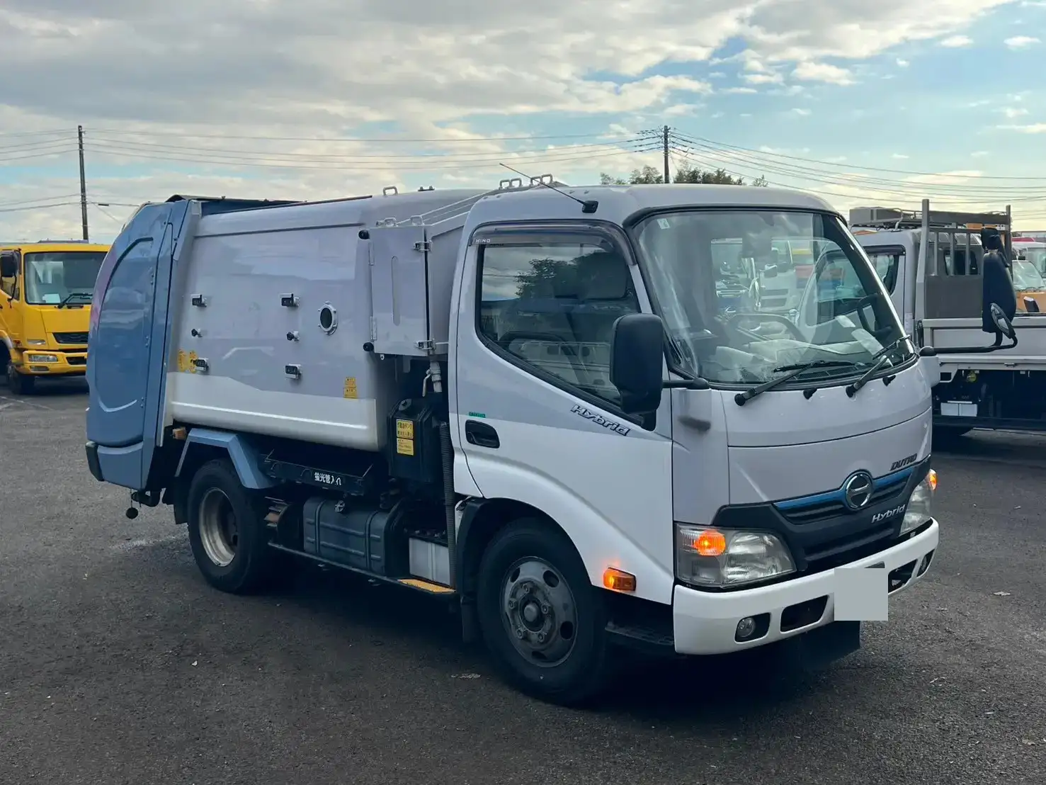日野 デュトロ 小型 パッカー車 巻き込み式 回転ダンプ式の中古トラック画像2