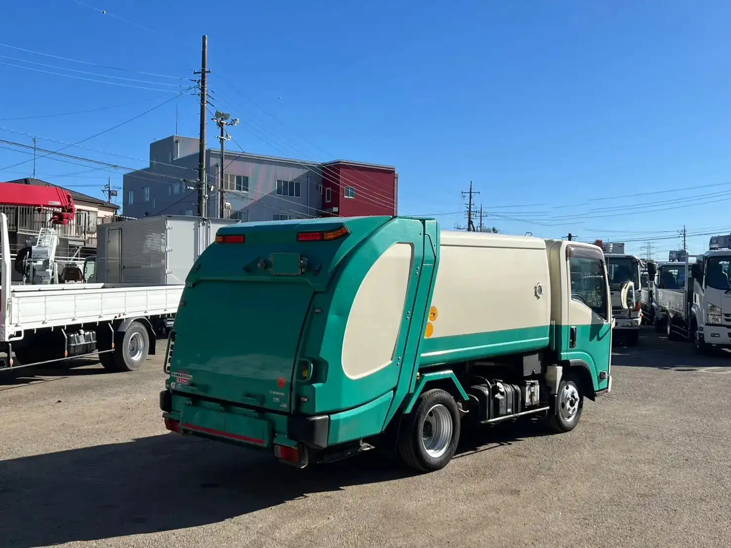 いすゞ エルフ 小型 パッカー車 巻き込み式 回転ダンプ式の中古トラック画像3