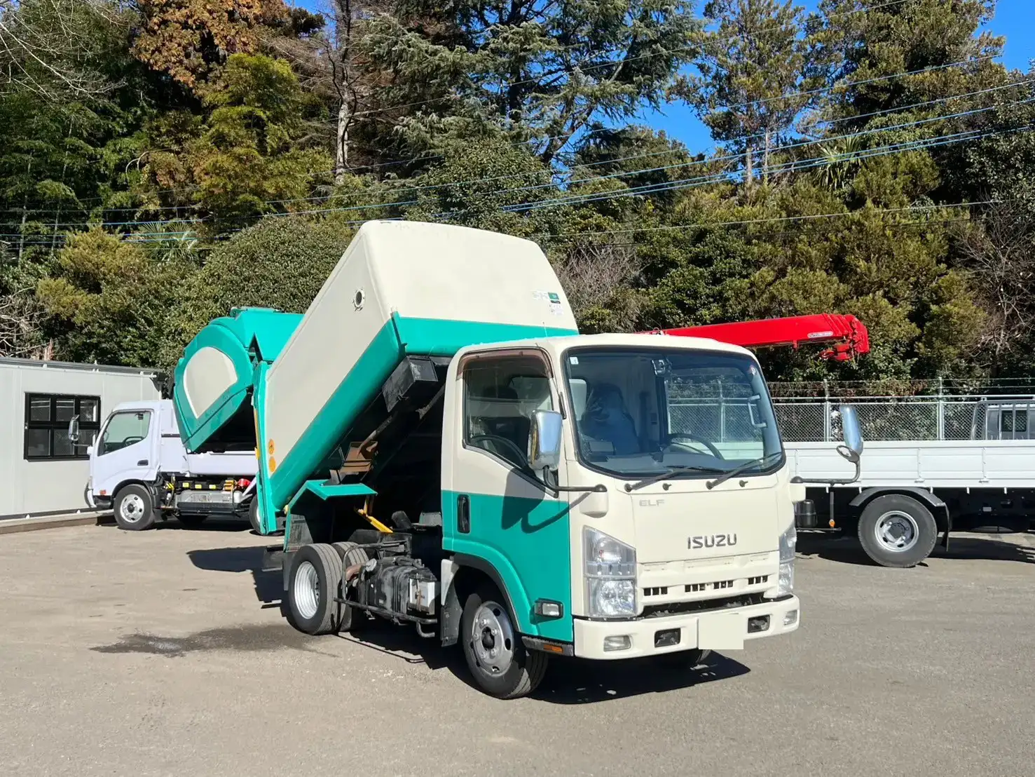 いすゞ エルフ 小型 パッカー車 巻き込み式 回転ダンプ式の中古トラック画像2