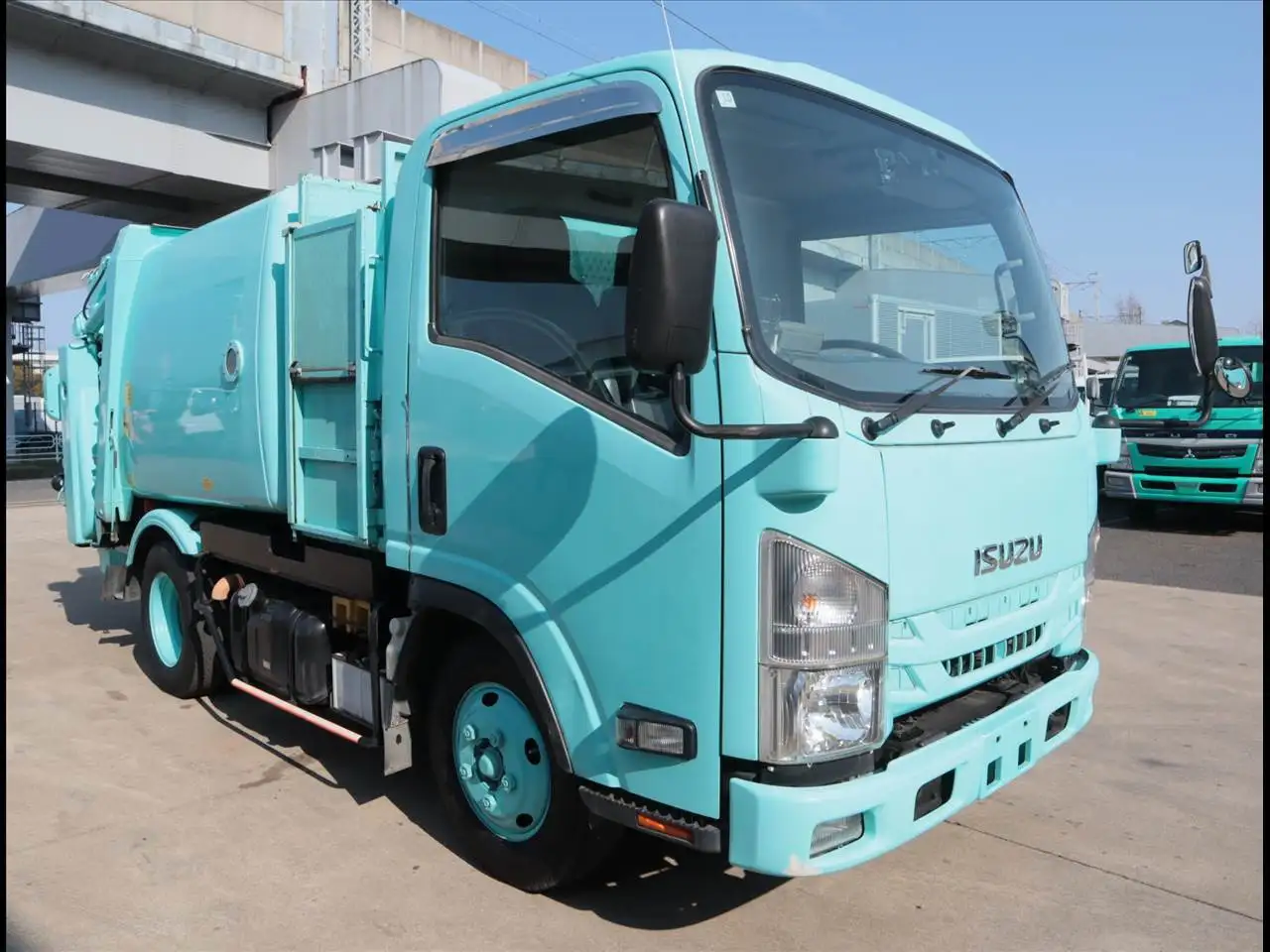 いすゞ エルフ 小型 パッカー車 巻き込み式 回転ダンプ式の中古トラック画像2