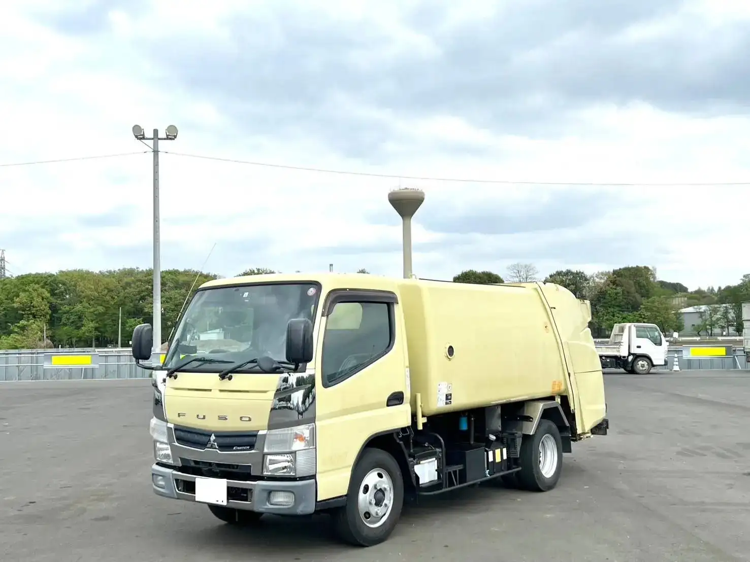 三菱 キャンター 小型 パッカー車 巻き込み式 回転ダンプ式｜画像1