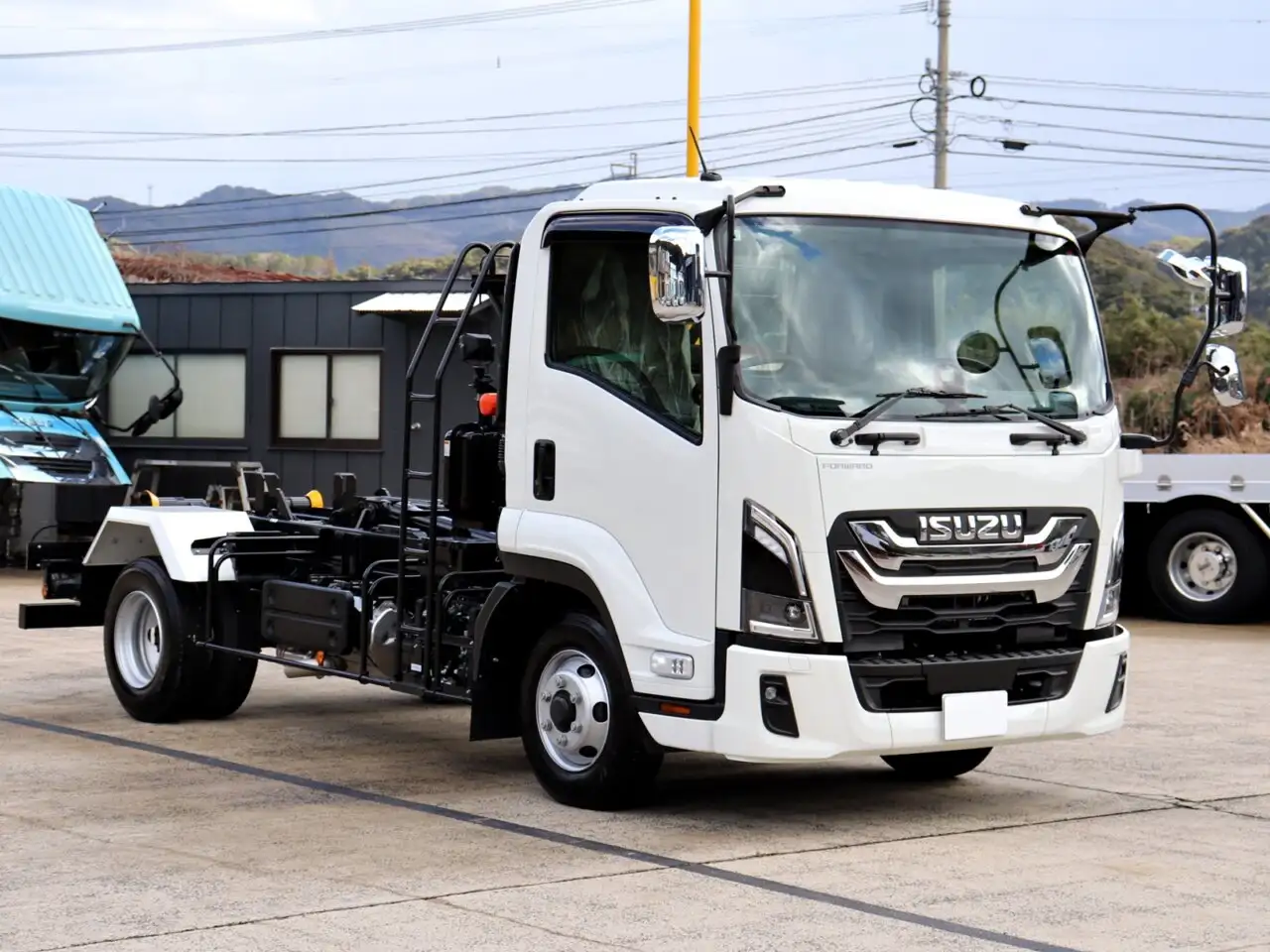いすゞ フォワード 中型/増トン アームロール シングルホイスト 2RG-FRR90S4の中古トラック画像2
