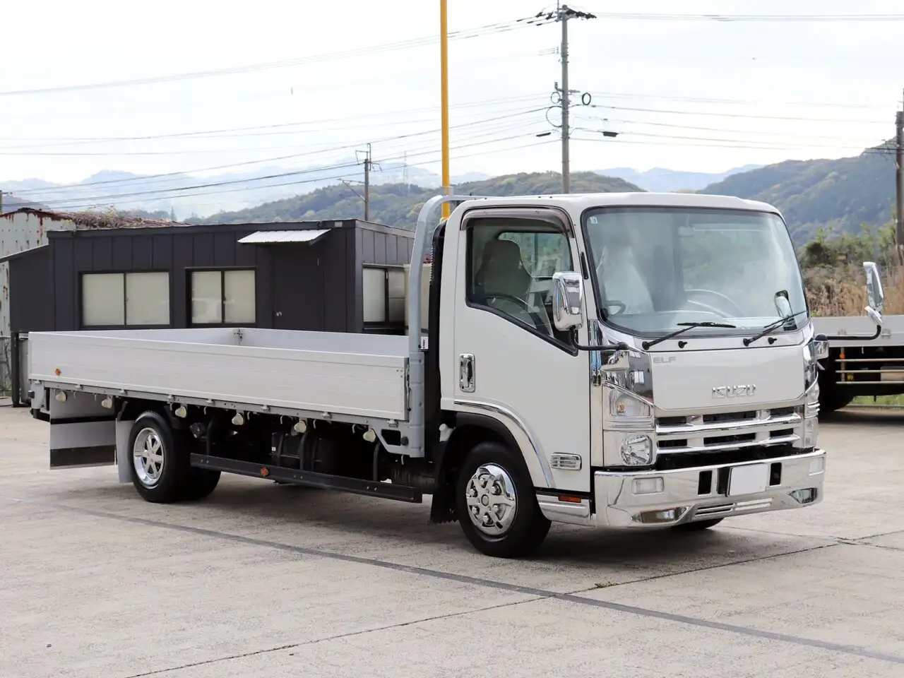 いすゞ エルフ 小型 平ボディ 床鉄板 アルミブロックの中古トラック画像2