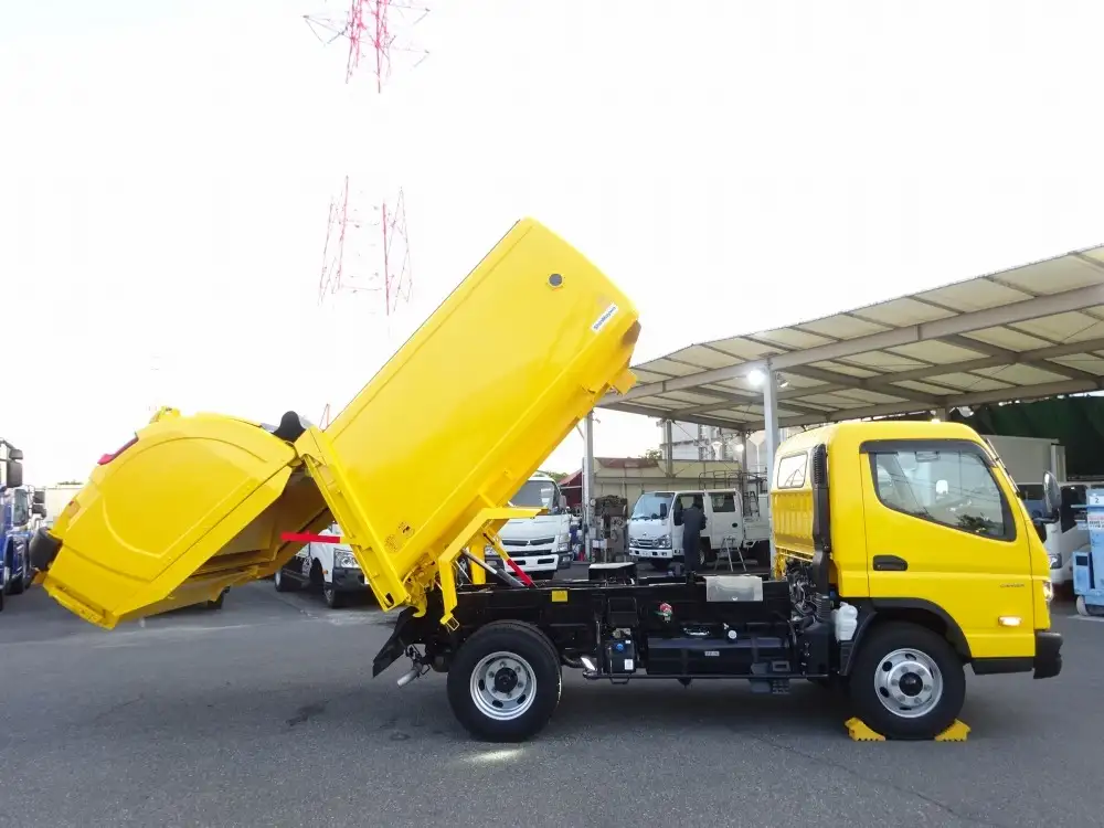 三菱 キャンター 小型 パッカー車 巻き込み式 回転ダンプ式の中古トラック画像2