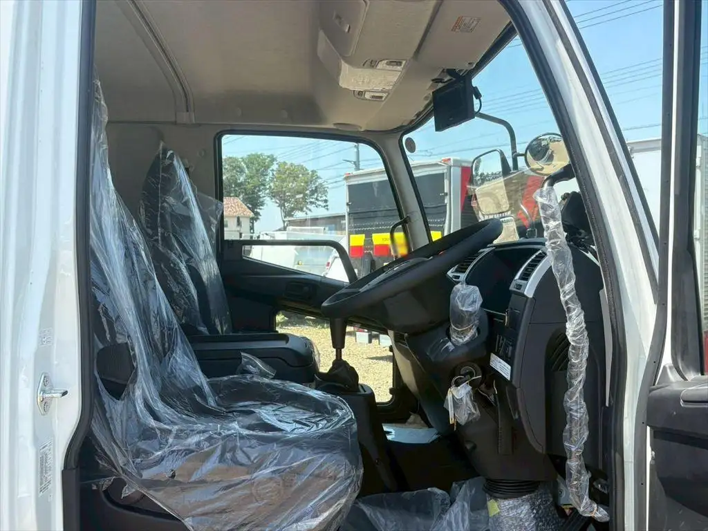 三菱 ファイター 中型/増トン パッカー車 プレス式 ベッドの中古トラック画像13