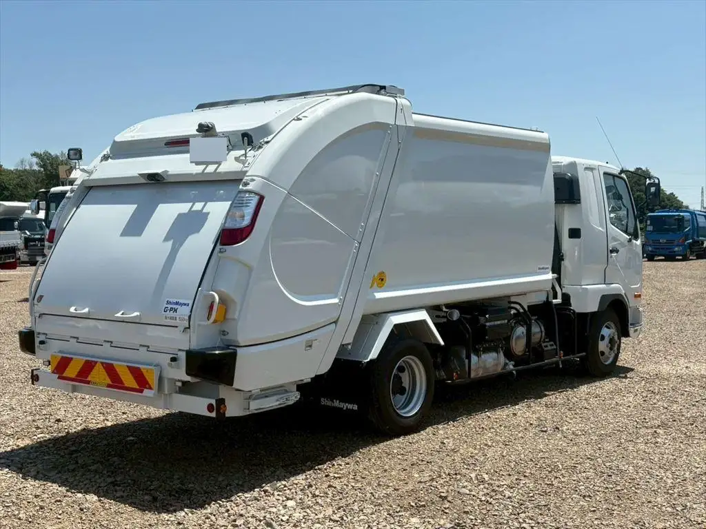 三菱 ファイター 中型/増トン パッカー車 プレス式 ベッドの中古トラック画像3