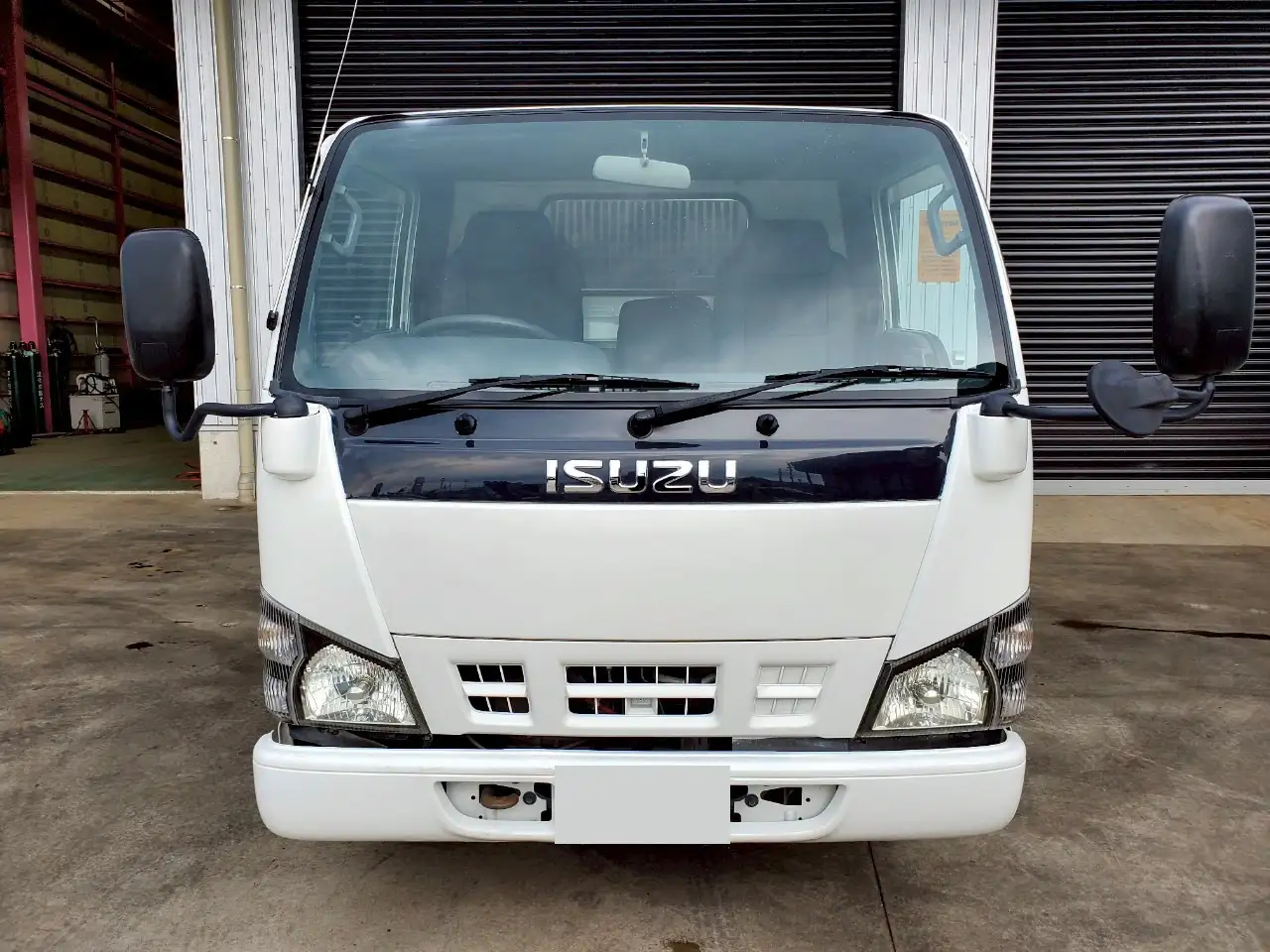 いすゞ エルフ 小型 ダンプ ローダー PB-NKR81Nの中古トラック画像1