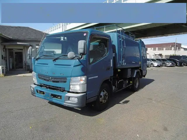 三菱 キャンター 小型 パッカー車 巻き込み式 回転ダンプ式の中古トラック画像1