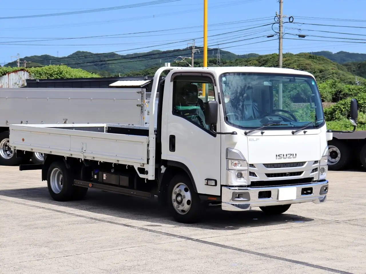 いすゞ エルフ 小型 平ボディ 2RG-NPR88AR R4の中古トラック画像2