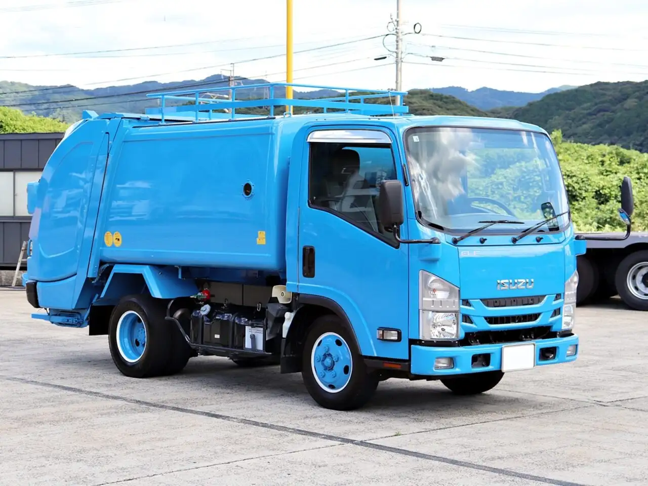 いすゞ エルフ 小型 パッカー車 巻き込み式 回転ダンプ式の中古トラック画像2