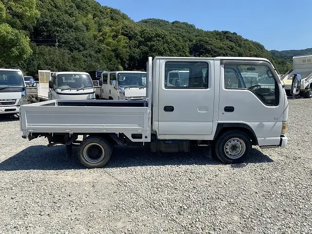 いすゞ エルフ 小型 平ボディ Wキャブ KR-NHR69Eの中古トラック画像4