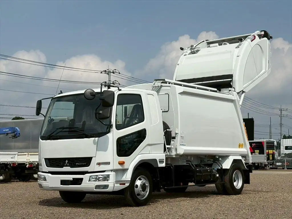 三菱 ファイター 中型/増トン パッカー車 プレス式 ベッドの中古トラック画像1