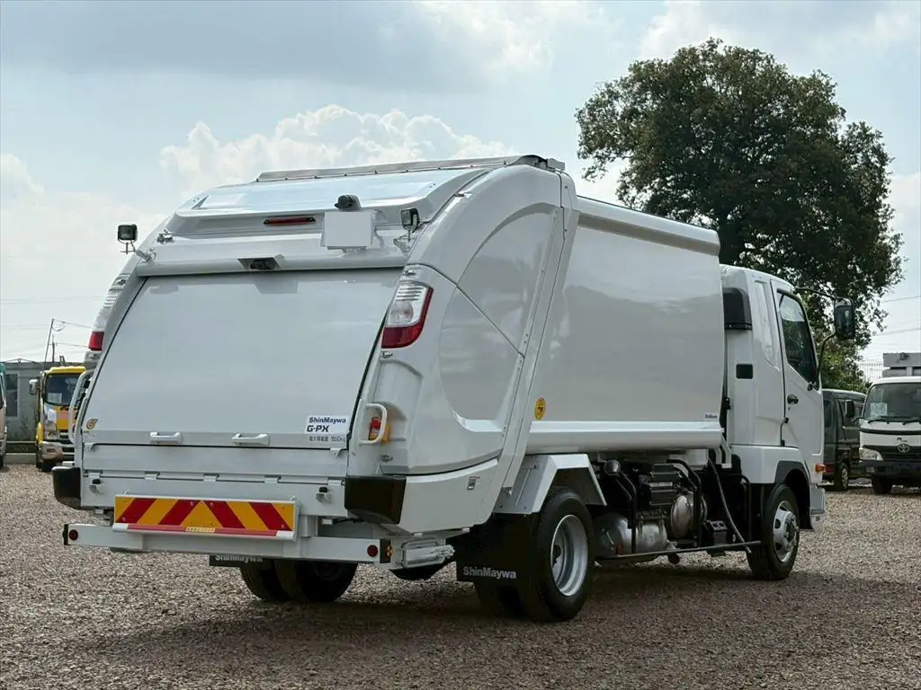 三菱 ファイター 中型/増トン パッカー車 プレス式 ベッドの中古トラック画像3