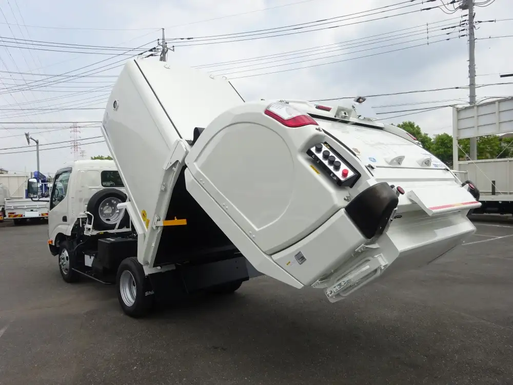 トヨタ ダイナ 小型 パッカー車 巻き込み式 回転ダンプ式の中古トラック画像7