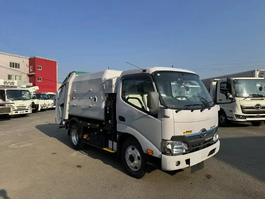 日野 デュトロ 小型 パッカー車 巻き込み式 回転ダンプ式の中古トラック画像2