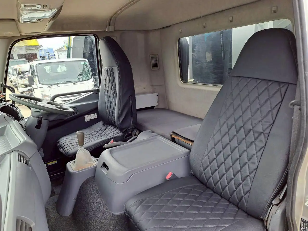 三菱 ファイター 中型/増トン パッカー車 プレス式 ベッドの中古トラック画像13