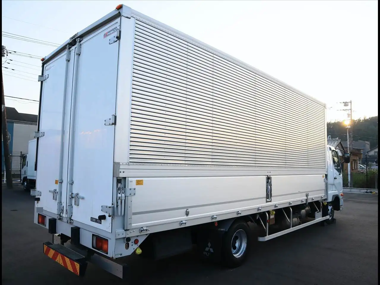 三菱 ファイター 中型/増トン ウイング ベッド 2KG-FK62Fの中古トラック画像2