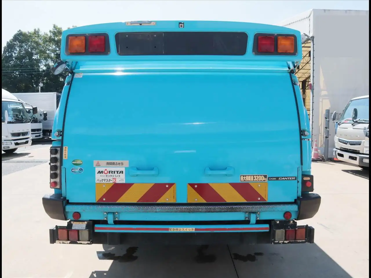 三菱 キャンター 小型 パッカー車 巻き込み式 回転ダンプ式の中古トラック画像4