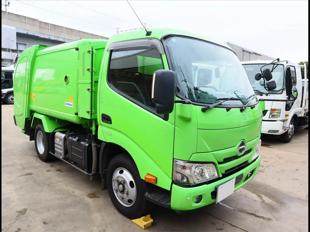 日野 デュトロ 小型 パッカー車 巻き込み式 回転ダンプ式の中古トラック画像2