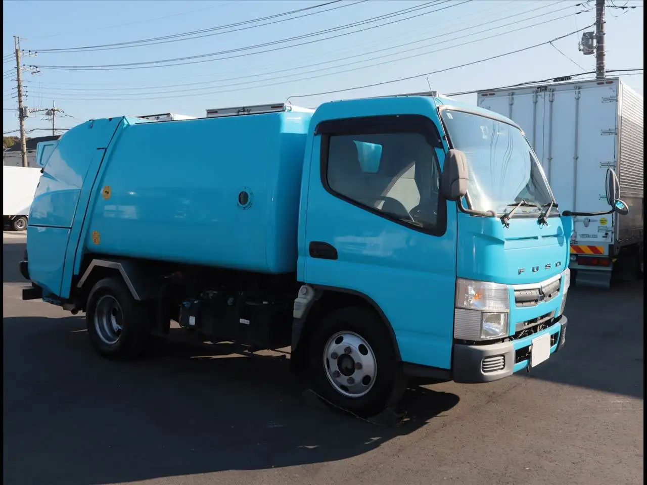 三菱 キャンター 小型 パッカー車 巻き込み式 回転ダンプ式の中古トラック画像2