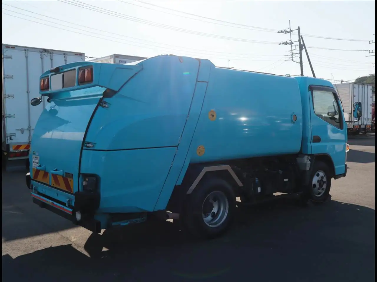 三菱 キャンター 小型 パッカー車 巻き込み式 回転ダンプ式の中古トラック画像3