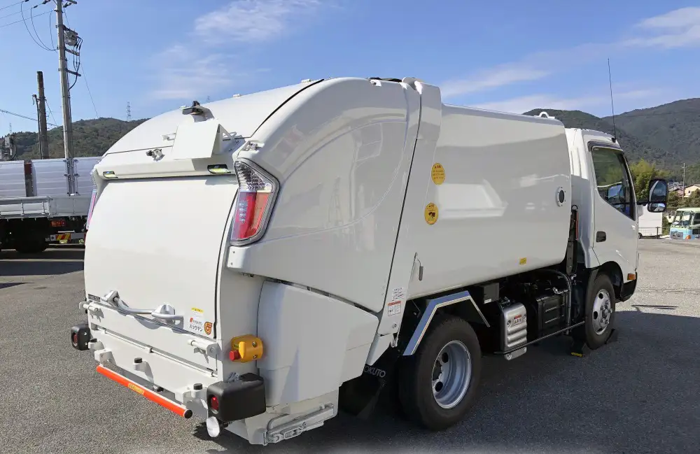 日野 デュトロ 小型 パッカー車 巻き込み式 回転ダンプ式の中古トラック画像2